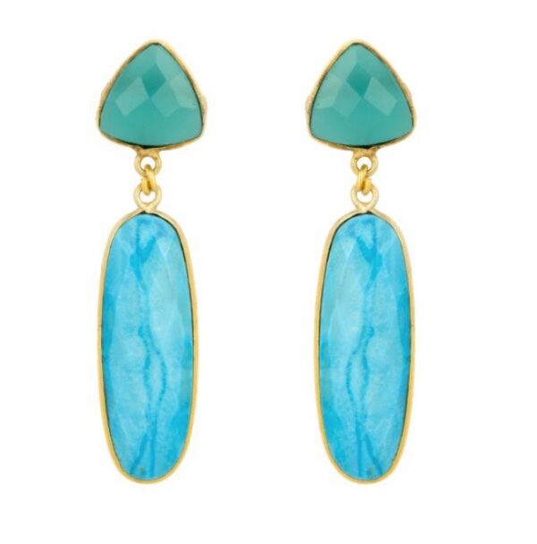 The Tallulah Turquoise earrings are stunning in colour and elegant in shape. The stud complements the earring and the rectangular stone drop elongates the neck and adds a touch of dramatic to the earring. The piece is light weight and easy to wear from day into night. THE FINER DETAILS 22 carat gold plated on brass Hypoallergenic sterling silver earring posts plated in 22 carat gold Delicately set with aqua chalcedony and turquoise gemstones Handcrafted by skilled artisans SIZE, FIT AND CARE 5.5cm drop To keep your jewellery in the best condition, we advise you to avoid contact with water, chlorine, soaps and alcohol – and to take care when wearing and/or removing them